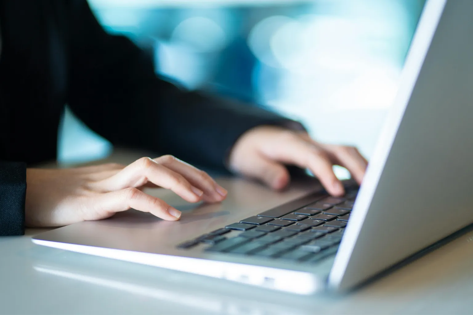 Person working on laptop on IT security